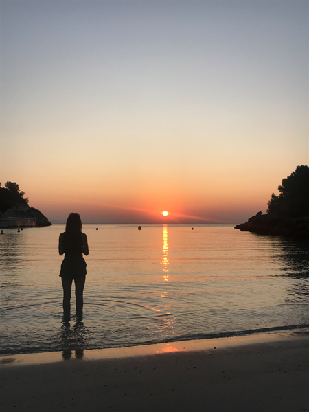 Woman silhouette in sunset