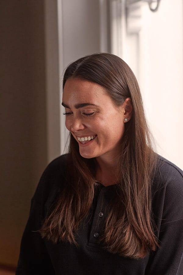 Jess Hatley smiling in a black tshirt