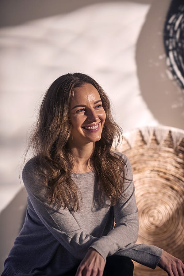 Verity smiling in a grey tshirt