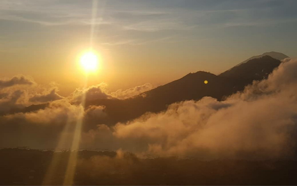 Sunset over clouds