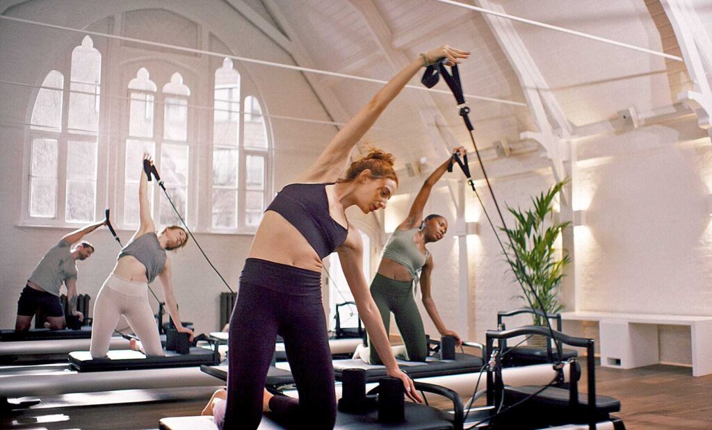 Women exercising in converted church