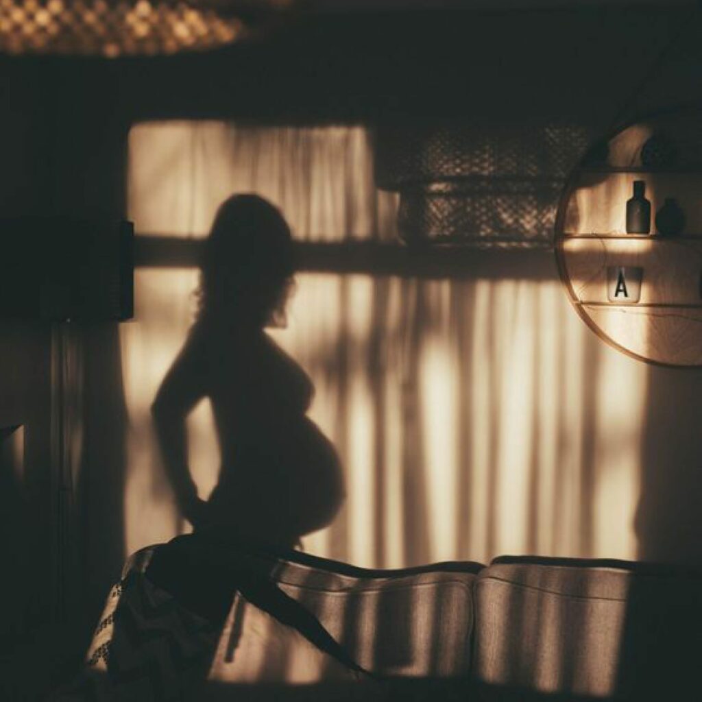 Pregnant woman's shadow